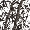 Black and grey bamboo stalks with leaves against a white background